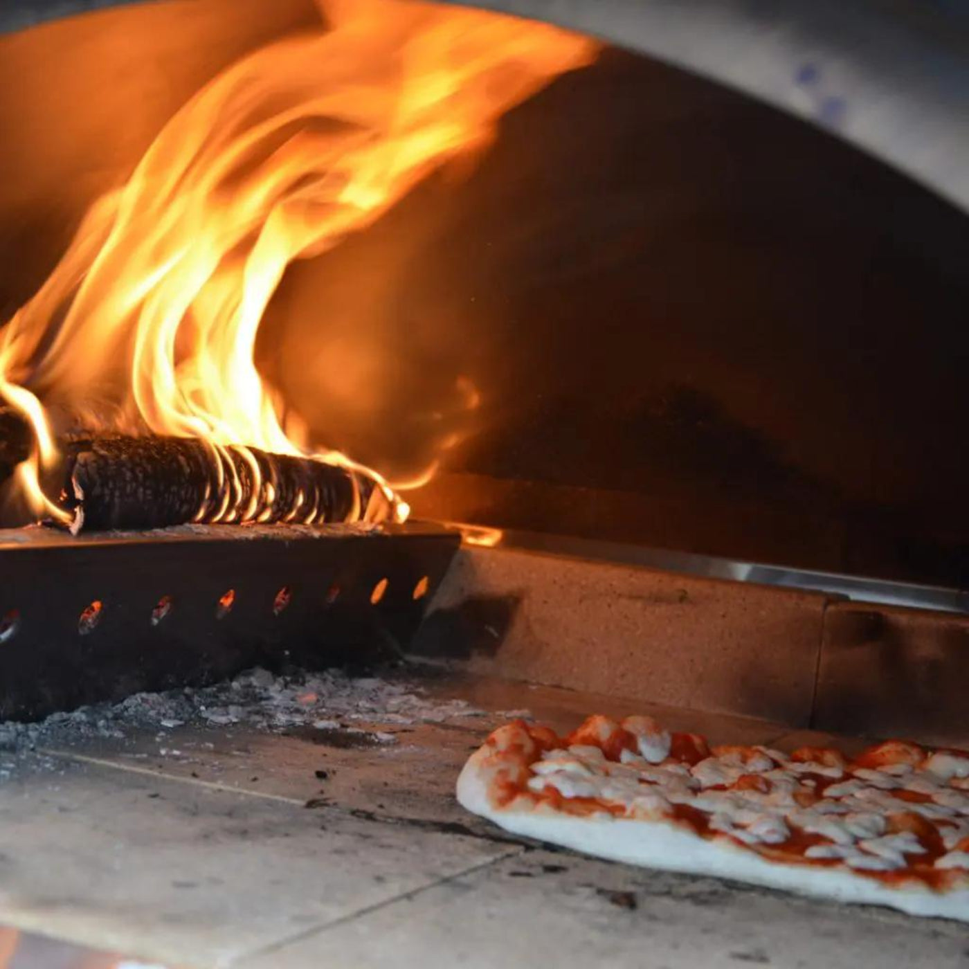 XO APPLIANCE XOPIZZA1SS Tabletop 24" x 16" Wood-Fired Oven in Stainless Steel On Black  - XOPIZZA1SS